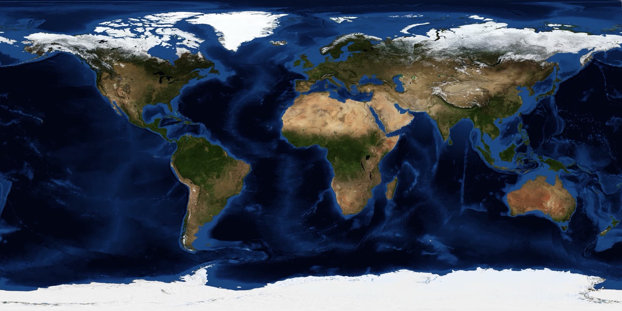 Flat satellite map of the whole Earth showing the continents in green and tan against deep blue oceans, with white ice at the poles
