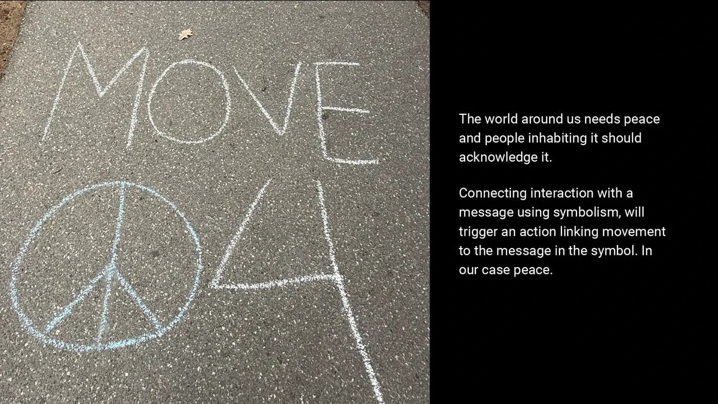Chalk peace sign and the word Move on asphalt