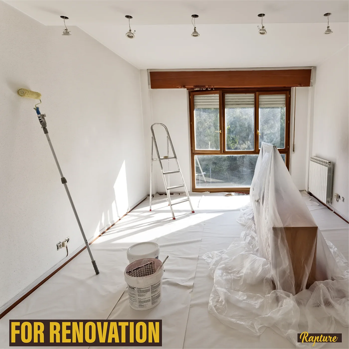 Room being painted with floor and furniture covered, For Renovation