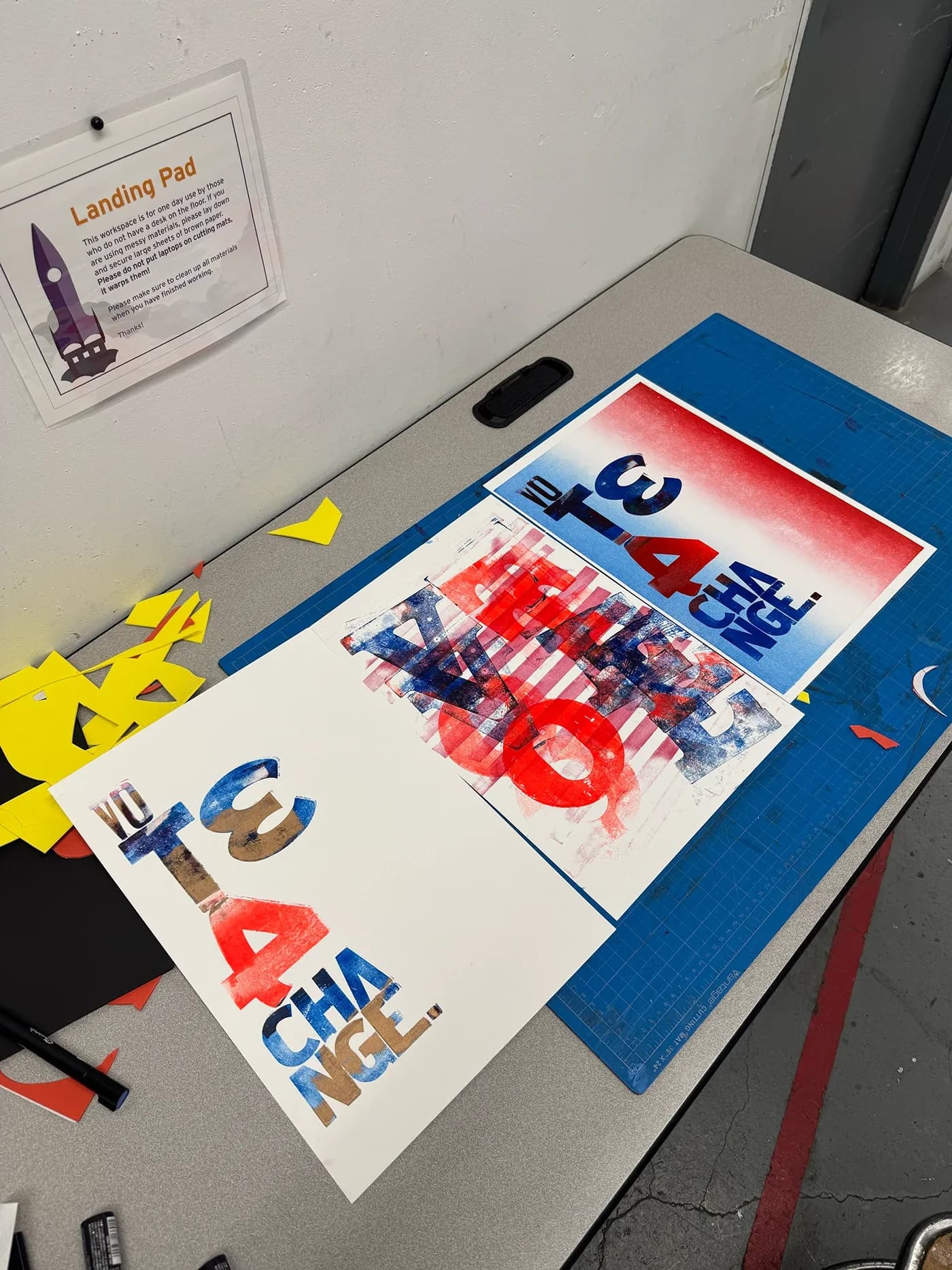 Vote 4 Change prints in red and blue on a cutting mat