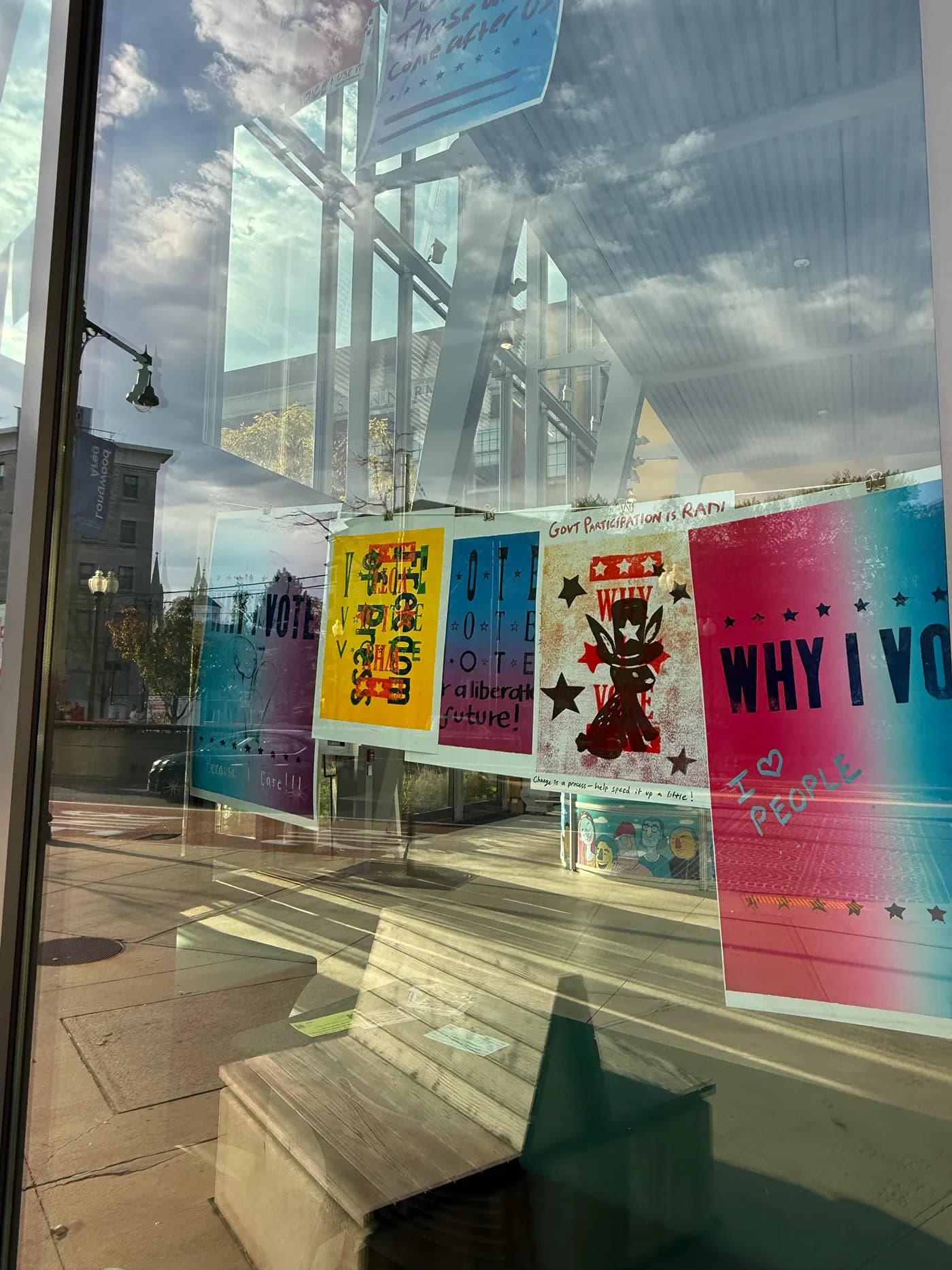 Close view of letterpress voting posters displayed in a window