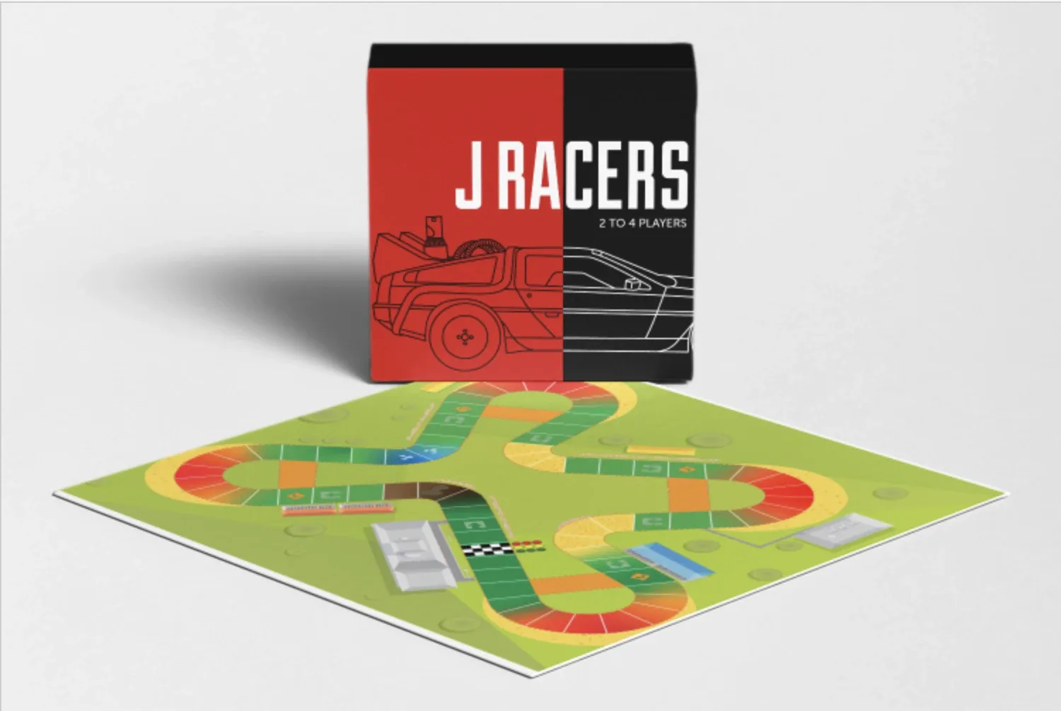 J Racers box in red and black standing behind the unfolded racetrack board