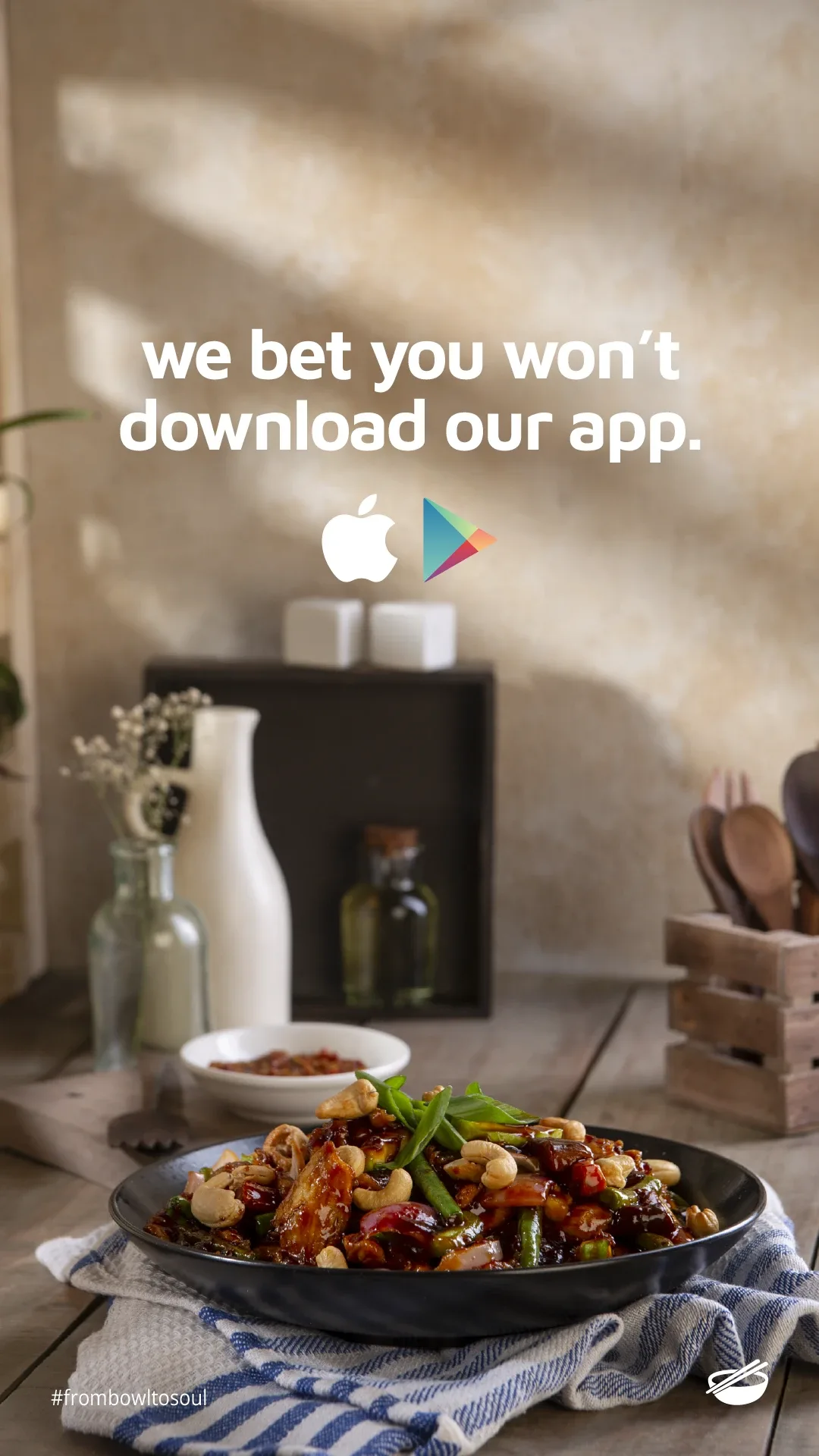 "We bet you won't download our app" over a cashew stir-fry plate
