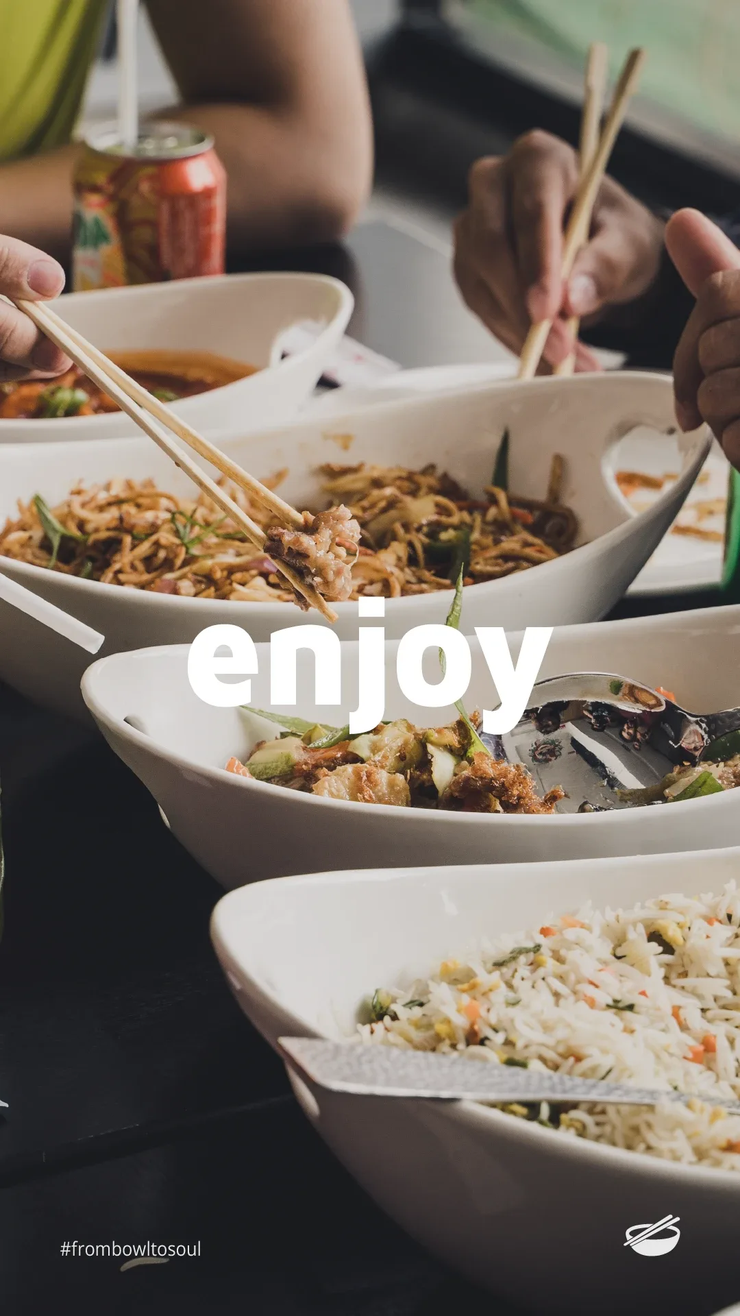 "Enjoy" over diners sharing noodles and rice with chopsticks