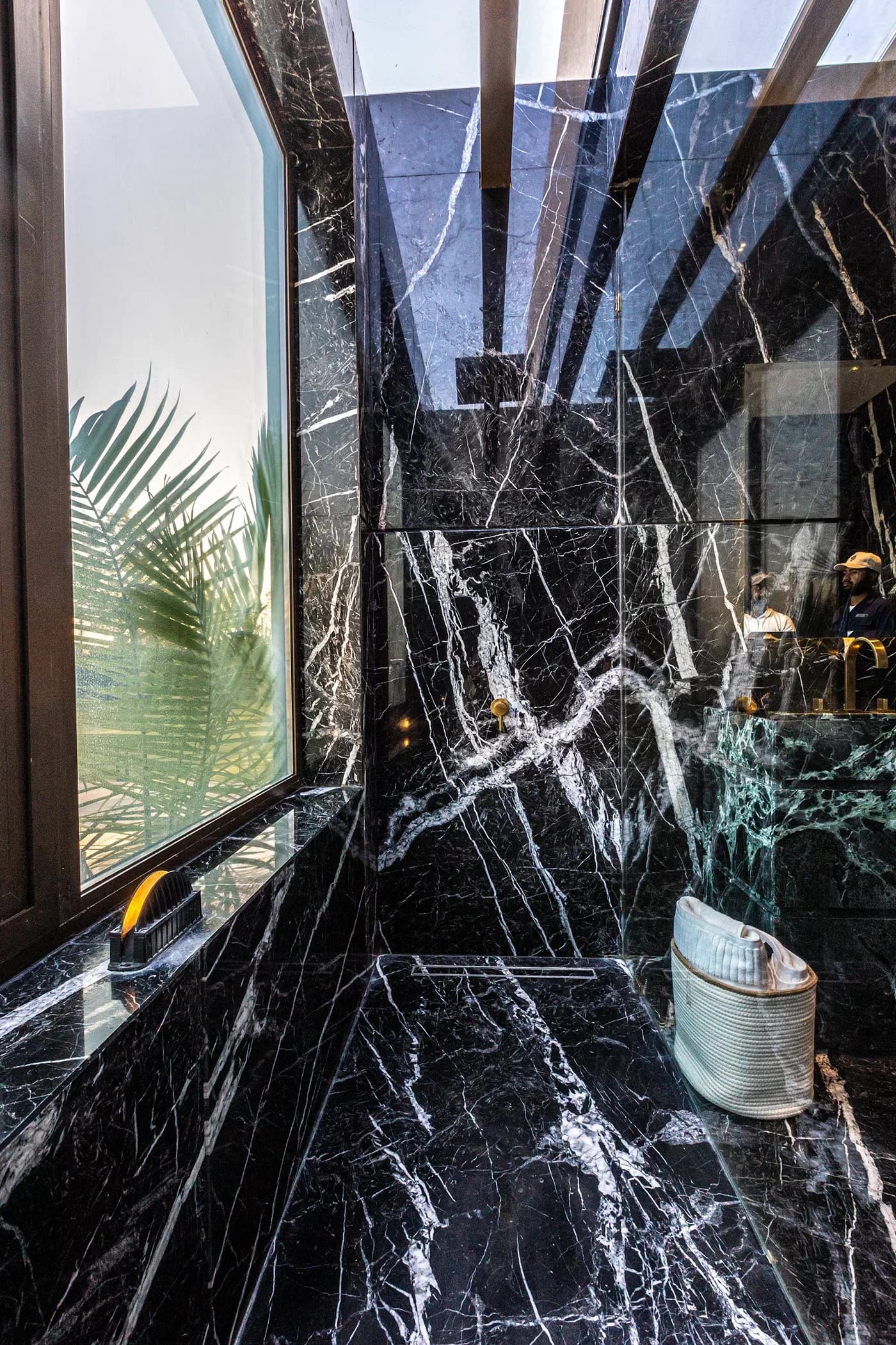 Black and white marble bathroom with window