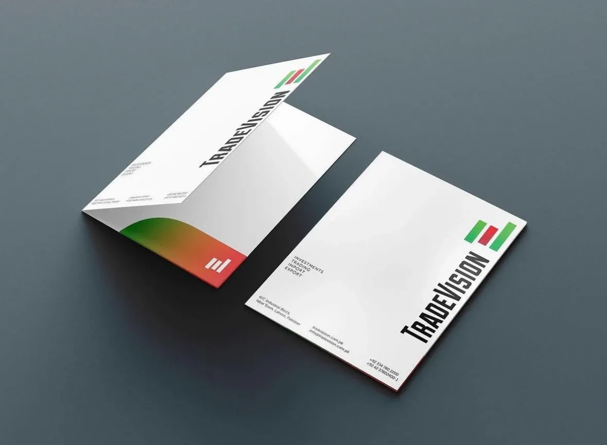 Open and closed TradeVision folders with green-to-red gradient pocket