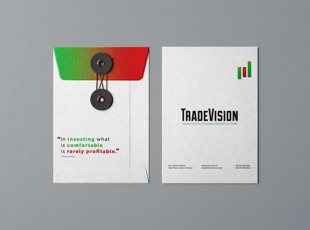 String-tie envelope with investing quote beside a TradeVision branded card