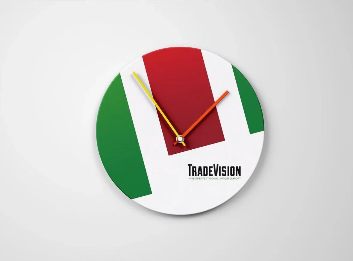 Wall clock with green and red bars and TradeVision logo