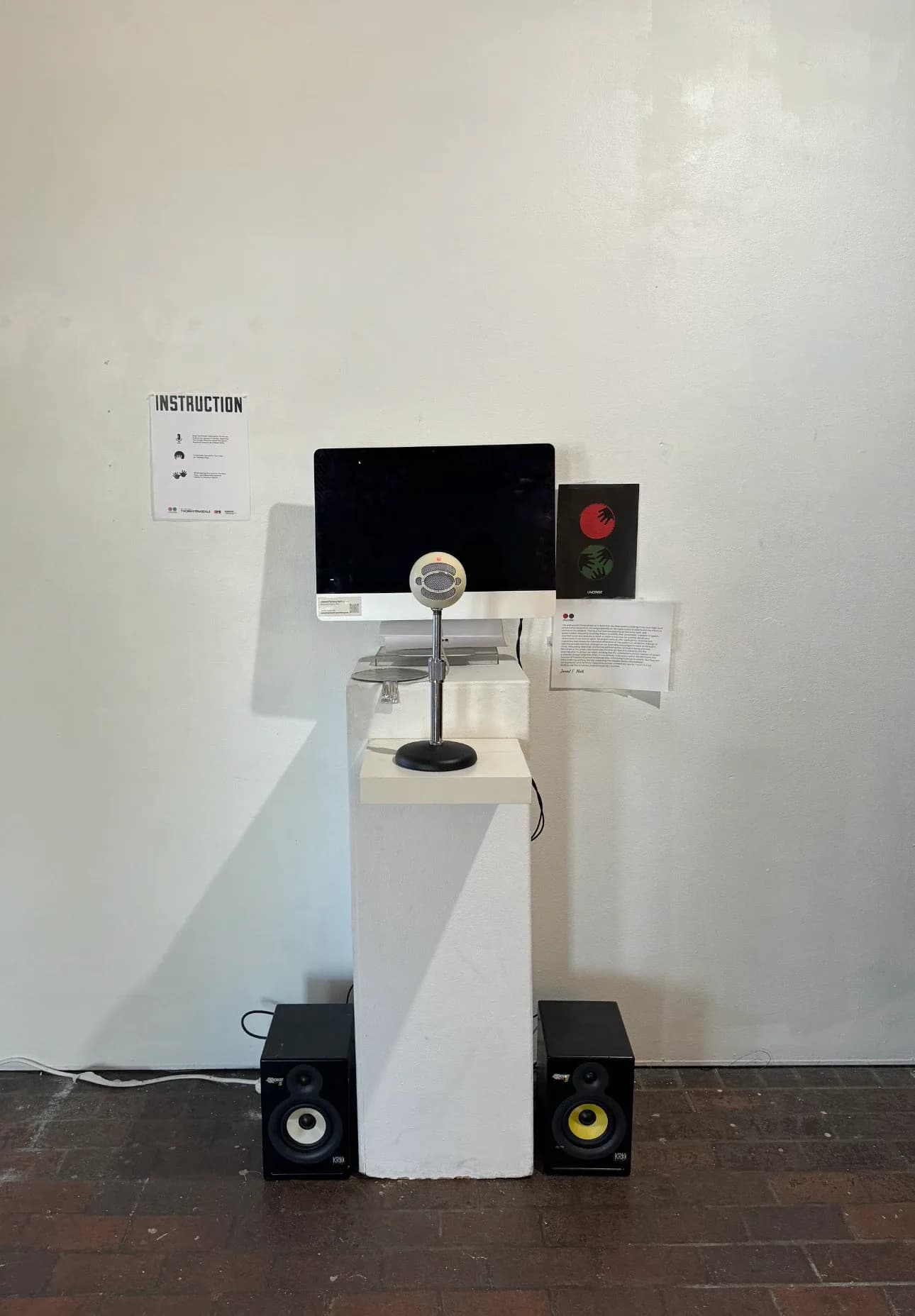 Front view of the installation with instruction sheet and poster